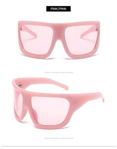 Front and side view of pink oversized shield sunglasses with thick plastic frames
