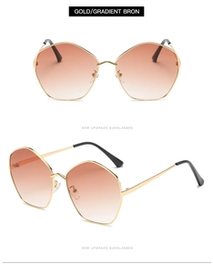Macro view of geometric sunglasses featuring golden metal frames and gradient bronze lenses