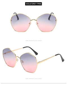 Detail of polygonal gold metal sunglasses with purple pink gradient lenses and slim frames