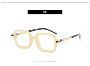 Vue latérale de lunettes de soleil rétro carrées crème avec branches épaisses bicolores