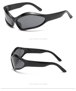 Detail view of black wrap-around Y2K sports sunglasses with dark grey lenses