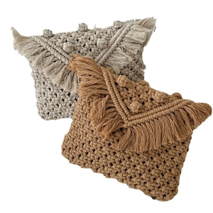 Bohemian handmade macrame crossbody bag with long fringes in cream and caramel