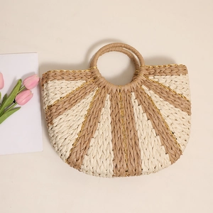 Handcrafted semicircular straw tote with gold thread stripes and round handles