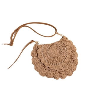 Handmade woven cotton straw crossbody bag with scallop edge design and leather strap
