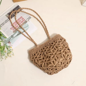 Handmade hollow floral straw shoulder bag for summer beach vacation and bohemian style