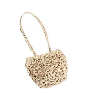 Handmade hollow daisy crochet straw bag with woven shoulder straps and inner lining for beach