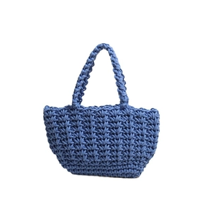 Blue woven cotton rope handbag with hollow fan texture for summer beach vacation style