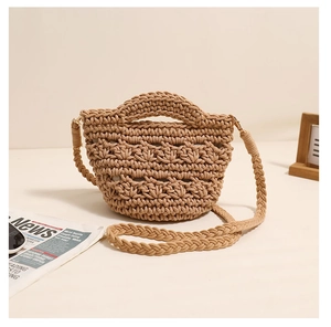 Detail of khaki hand-woven cotton rope bag with textured knots and detachable strap