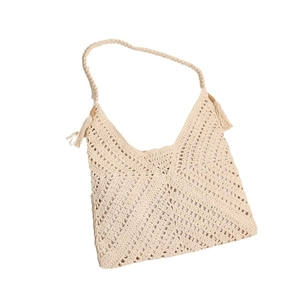 Beige crochet hollow-out crossbody bag with fringe tassels for casual summer beach vacation