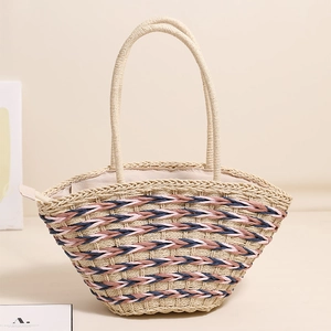 Handmade woven straw tote bag with blue and pink stripes and top handles for beach holidays