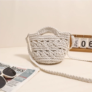 Chic beige crochet crossbody bag with woven wave pattern for beach vacation use