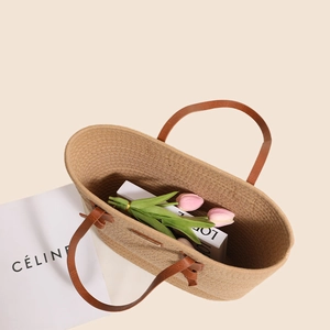 Large cotton rope woven tote bag with brown leather handles and knot details
