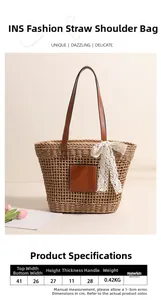 Size chart for woven straw beach tote bag with leather handles and white lace bow detail