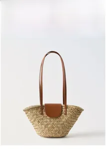 Detail of bohemian straw shoulder bag featuring brown leather flap and PU stitching