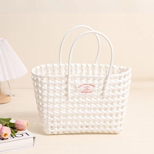 White woven hollow plastic tote bag with double handles for beach vacation and storage