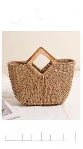 Detail of diamond-shaped wooden handle and gold-thread straw woven beach handbag