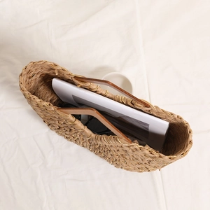 Handcrafted straw tote bag with diamond wood handles and metallic thread detailing
