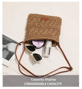 Detailed interior of woven straw crossbody bag showing capacity for daily essentials