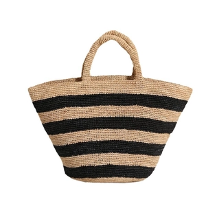 Large striped raffia tote bag with handwoven pattern for summer beach vacations
