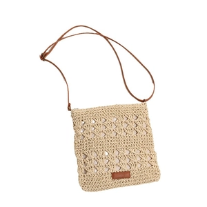 Chic hollow straw crossbody bag in beige with brown shoulder strap for beach vacation