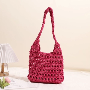 Large magenta woven cotton tote bag with hollow crochet design for beach vacation style