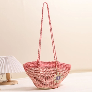 Pink gradient straw shoulder bag with floral charm for summer beach vacation