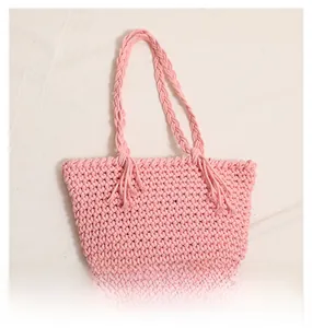 Top view of pink handmade cotton woven tote bag with fringe details and large capacity