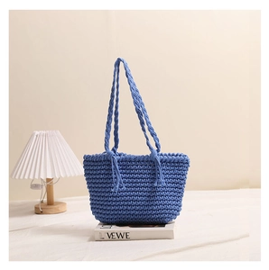 Detailed view of the Klein blue handwoven cotton rope texture on this stylish beach tote bag