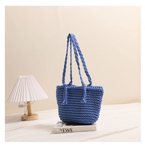 Detail of the royal blue thick cotton woven bag featuring handcrafted knit texture