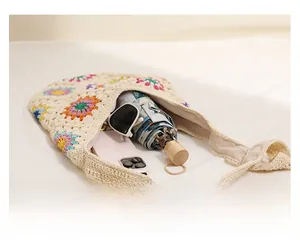 Detail view of the spacious woven bag interior with floral patterns and daily essentials