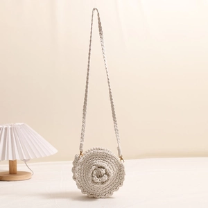 Handmade cream crochet round crossbody bag with 3D rose pattern and golden metal buckles
