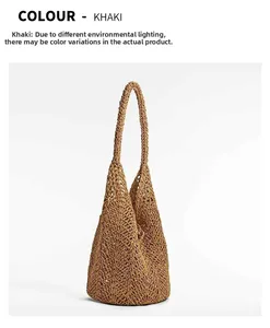 Detailed close-up of khaki woven straw handbag showing intricate hollow mesh texture
