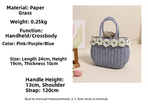 Detail view of woven straw beach bag featuring crochet flowers and dimensions 24x19x10cm