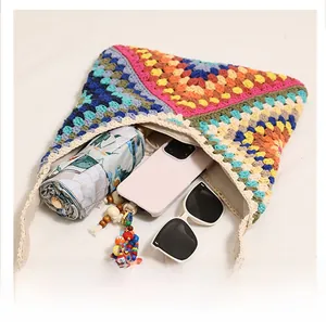 Detail showing the inner capacity of this bohemian crochet bag with daily essentials