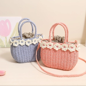 Floral woven straw crossbody bag with polka dot lining and cute crochet flowers decor