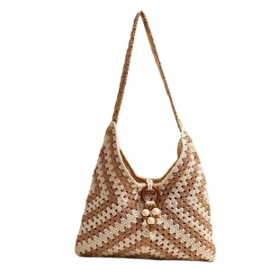 Boho style brown and beige chevron crochet shoulder bag with wooden ring closure
