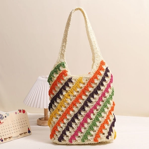 Colorful striped crochet straw shoulder bag with hollow knit patterns for beach vacations