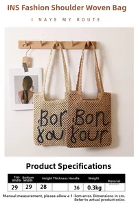 Detail of woven tote bag with letter embroidery and long shoulder straps for summer beach