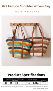 Close-up of handmade straw tote bag with colorful stripes and premium leather shoulder strap