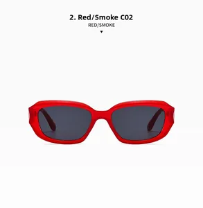 Detail view of bold red rectangle sunglasses with high-gloss finish and smoke grey lenses