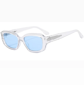 Detail of blue lenses and transparent rectangle frame with silver metal accents