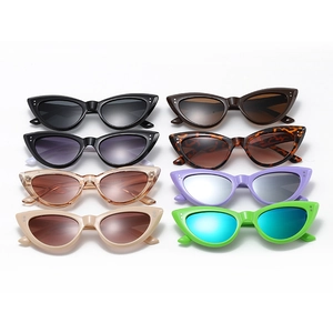 Eight colors of vintage cat-eye sunglasses with thick frames and silver stud accents