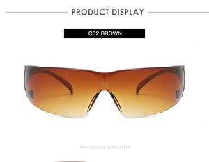 Detail view of brown gradient oversized rimless sunglasses in y2k wrap-around style