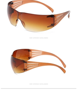 Detail of amber gradient wraparound sunglasses with unique triple-slotted temple design