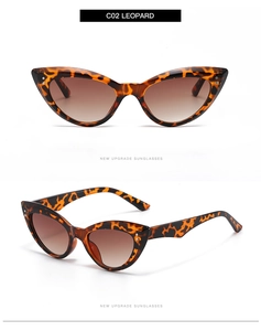 Detail of leopard print cat eye sunglasses with brown gradient lenses and studs