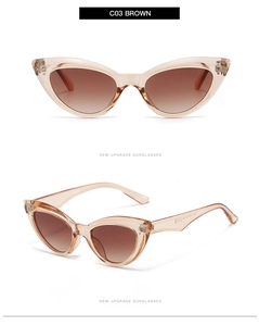 Detail view of cat eye sunglasses with brown gradient lenses and rice nail hinges