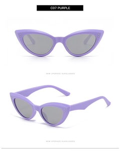 Detailed front and side view of purple cat eye sunglasses with silver stud accents