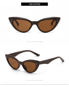 Detail view of coffee-colored cat eye sunglasses with metallic stud embellishments