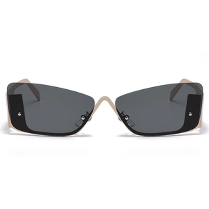 Futuristic cat-eye semi-rimless sunglasses with dark lenses and gold metal frame