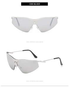Détail de lunettes de soleil argentées demi-cerclées avec logo croissant sur le pont